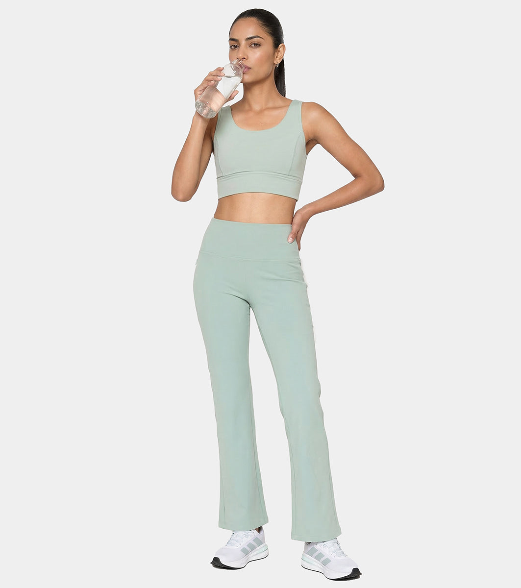 Enamor Fav Flare Pants – Butter-soft dry-fit, high-rise support & sleek flared style -A407 (Sage Green)