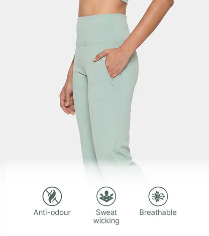 Enamor Fav Flare Pants – Butter-soft dry-fit, high-rise support & sleek flared style -A407 (Sage Green)